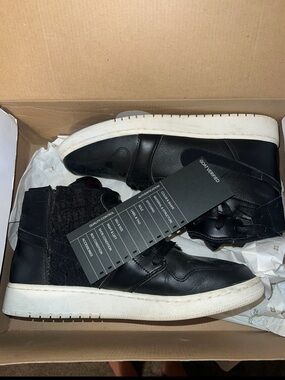 Woman’s Jordan air 1 rebel xx  Black High-Top Sneakers with White Sole